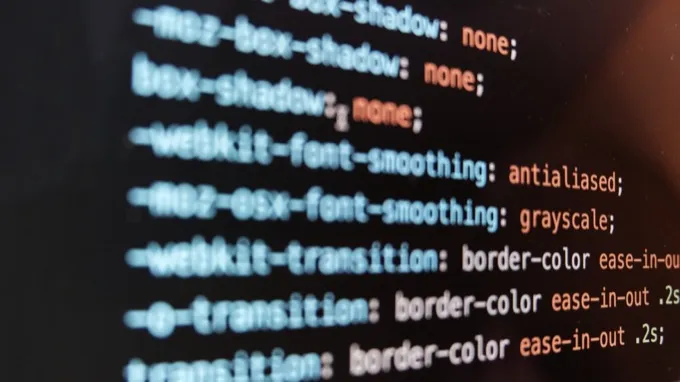 Programming code on dark screen
